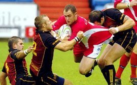 Alex Wilkinson drives at the Leigh defence - Sep 3rd 2006.