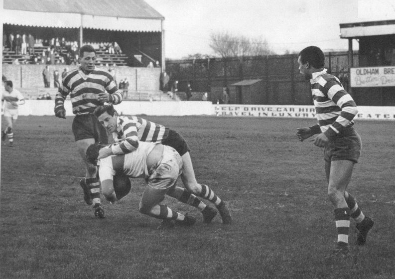 John Donovan makes a tackle with Dave Parker and Mike Elliott in support v Liverpool - Nov 6th 1965.