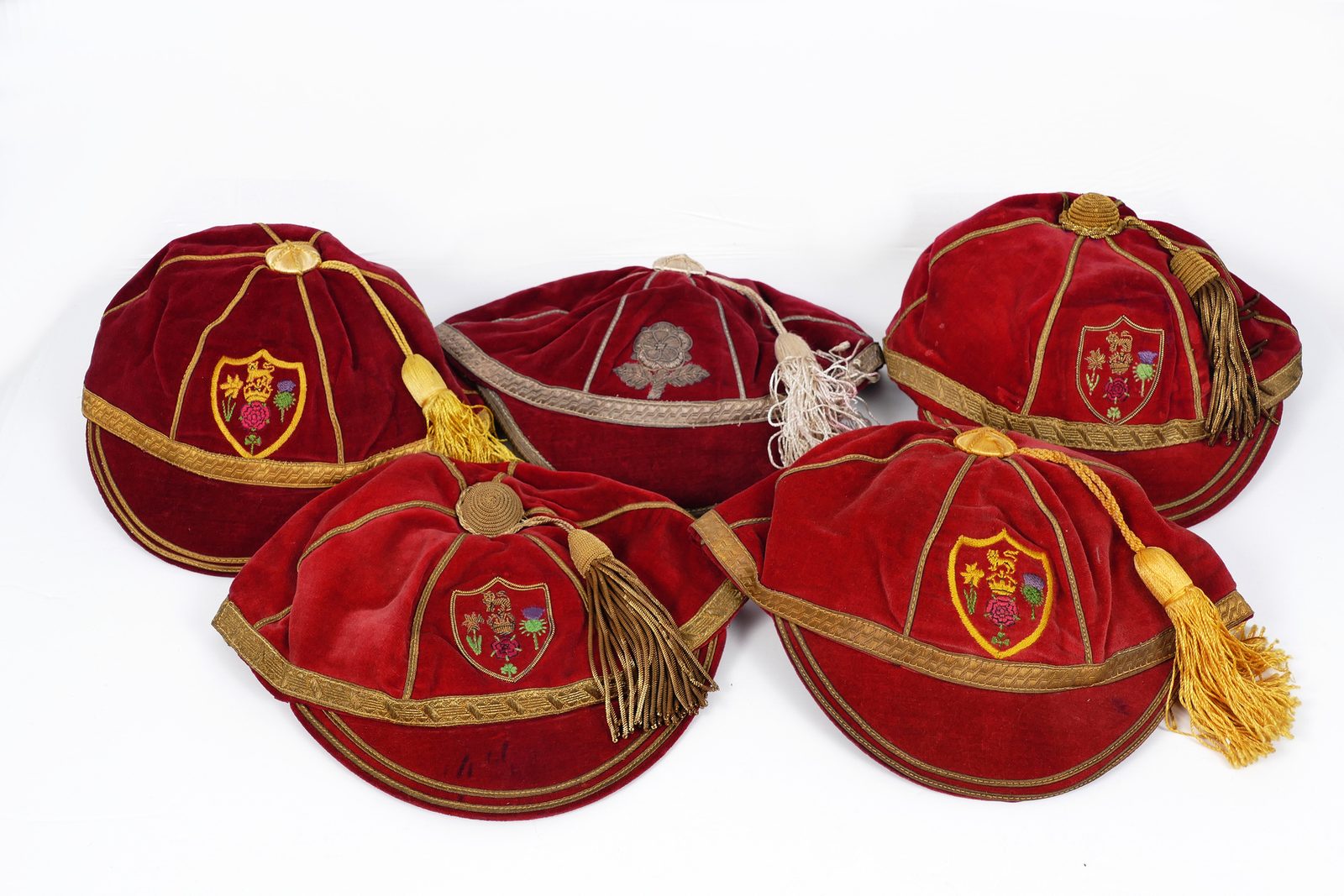The caps of Alan Davies. 3 Great Britain + 1 England.