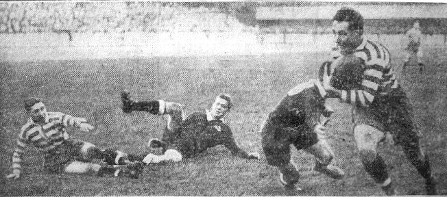 Joe Corsi evades a New Zealand opponent after taking a pass from the grounded George Hesketh - Oct 23rd 1926.