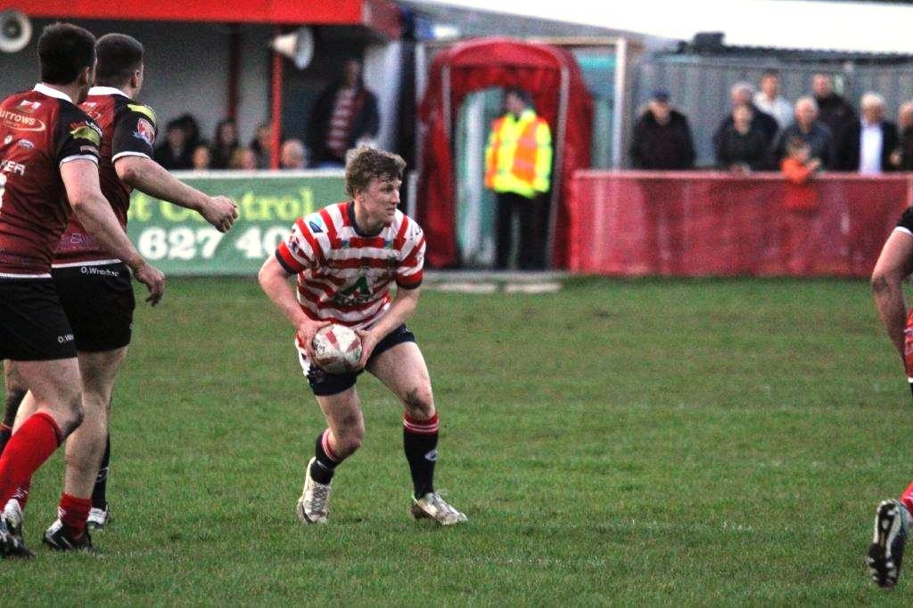 Gareth Owen looks to release a pass v North Wales - April 8th 2015.