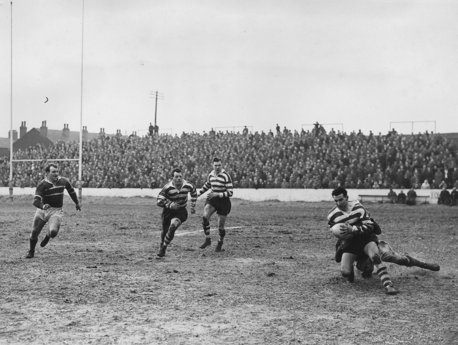 Pitchford is tackled by Chisnall - March 22nd 1958.