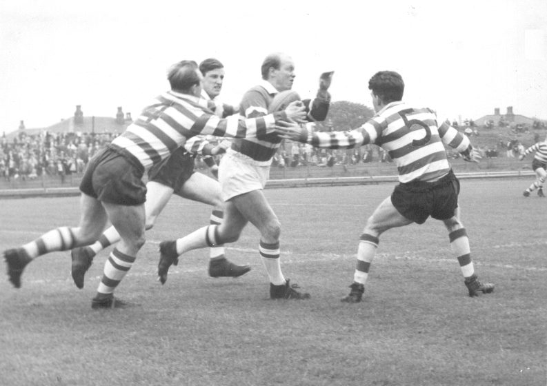 Bill Patterson, Vince Nestor and John Donovan close in on a Rochdale attacker - Aug 15th 1964.