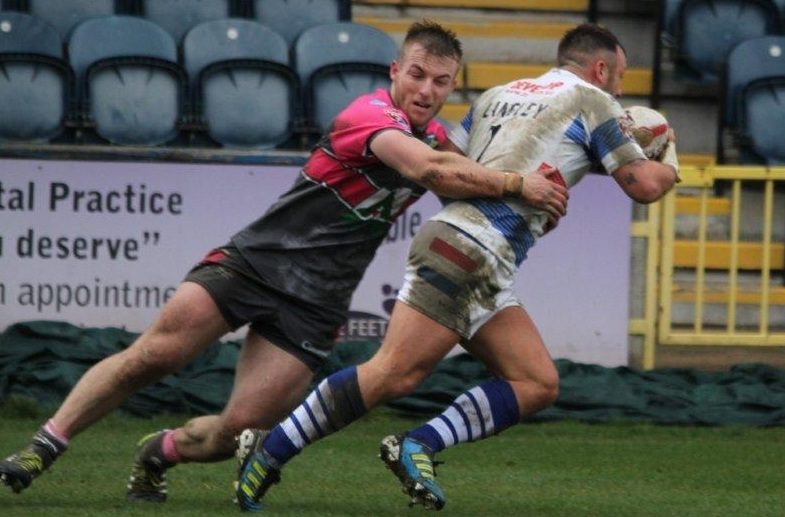 Adam Clay brings down Gareth Langley at Rochdale - April 3rd 2015.