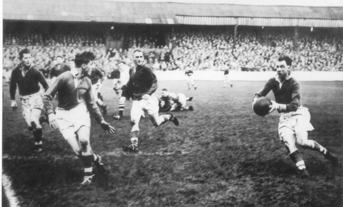 Frank Heyes takes on the Salford defence after a pass from Arthur Tomlinson - Oct 7th 1950.