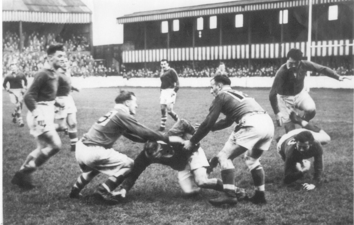 Arthur Tomlinson is tackled by Dai Moses and Jim Grainger - Oct 7th 1950.