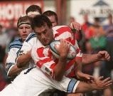 Reece Guy is well held v Sheffield. Last senior match at Watersheddings - Aug 25th 1996.