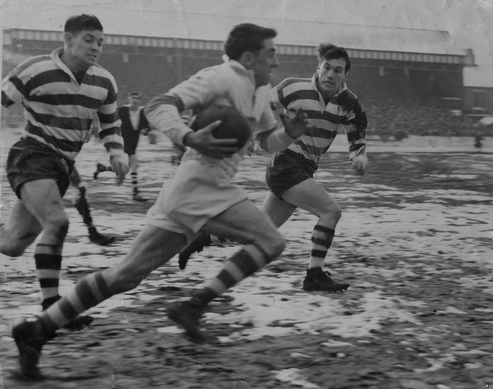 Alan Davies and Terry O’Grady give chase to the St. Helens winger Eric Ledger - Feb 19th 1955.