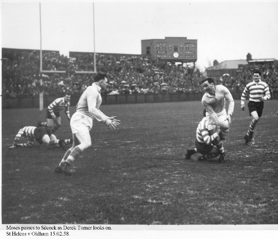 Glyn Moses prepares to pass to Nat Silcock as he is tackled while Derek Turner looks on - Feb 15th 1958.