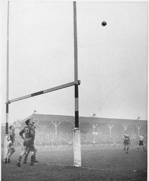 Vince Karalius watches as a goal attempt by Johnny Noon goes wide - Jan 23rd 1960.