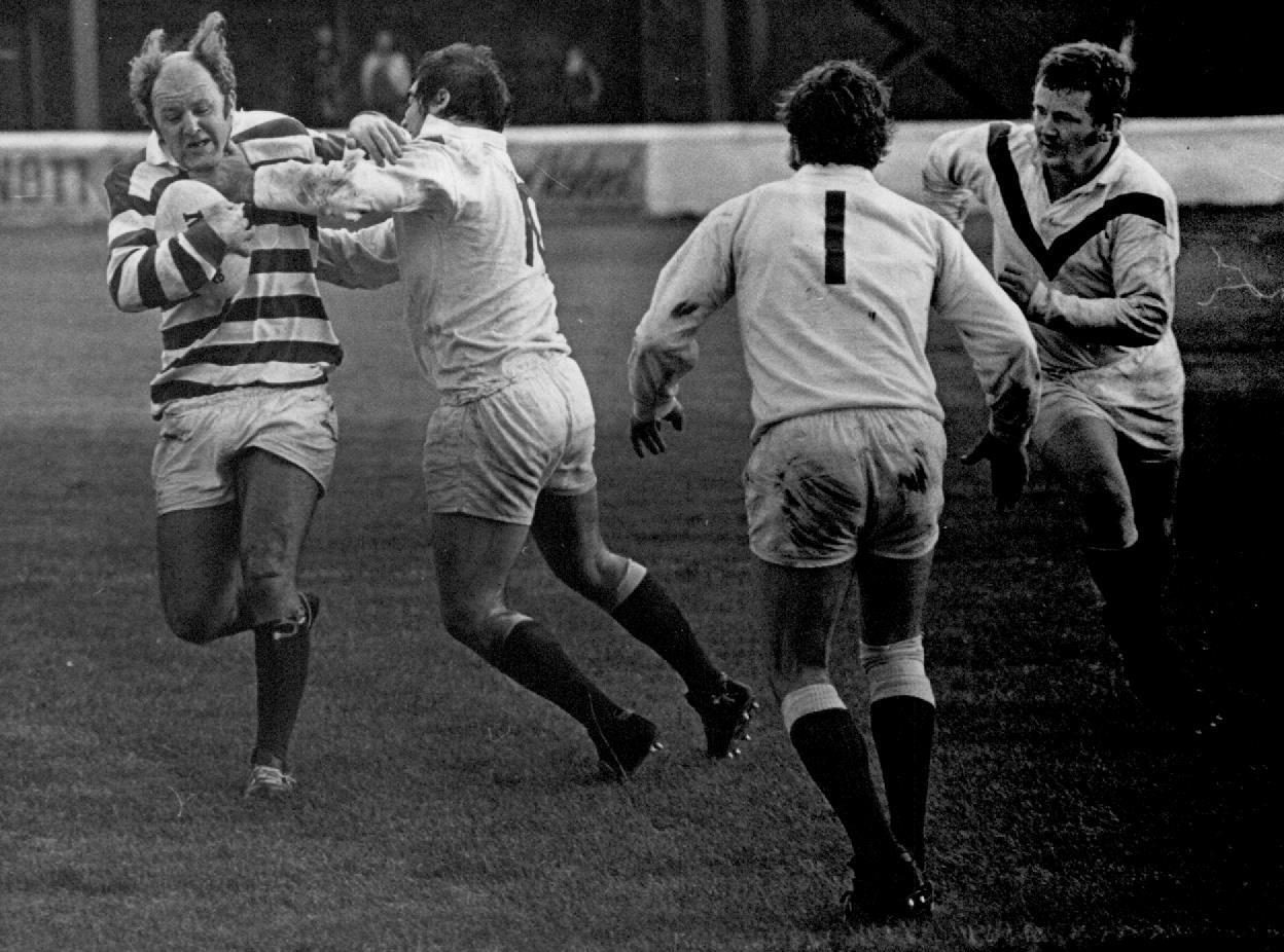 Kevin Flanagan is surrounded by St Helens defenders - Aug 31st 1975.