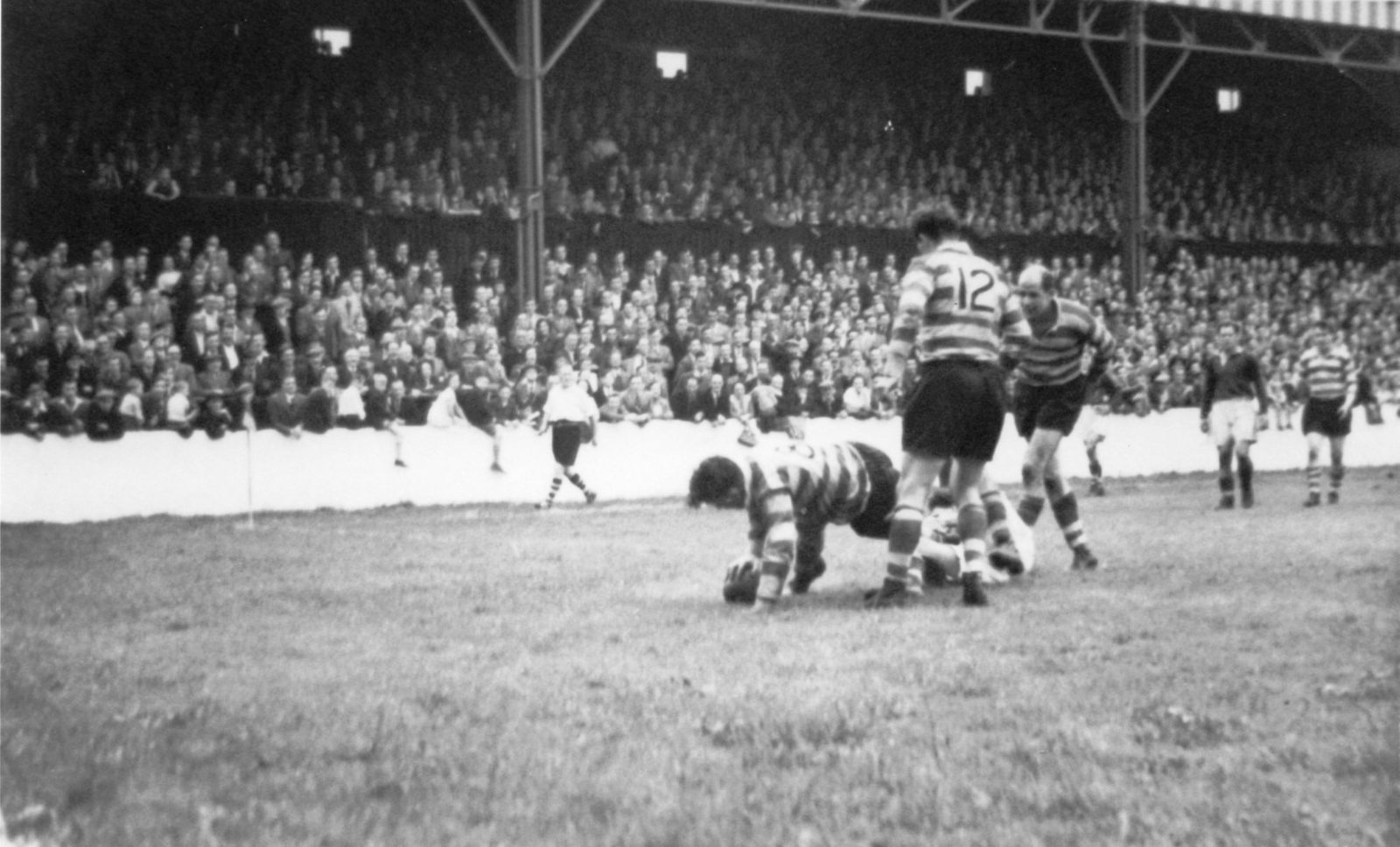 Harry Ogden scores as Sid Little and Bryn Day watch on - Aug 30th 1952.