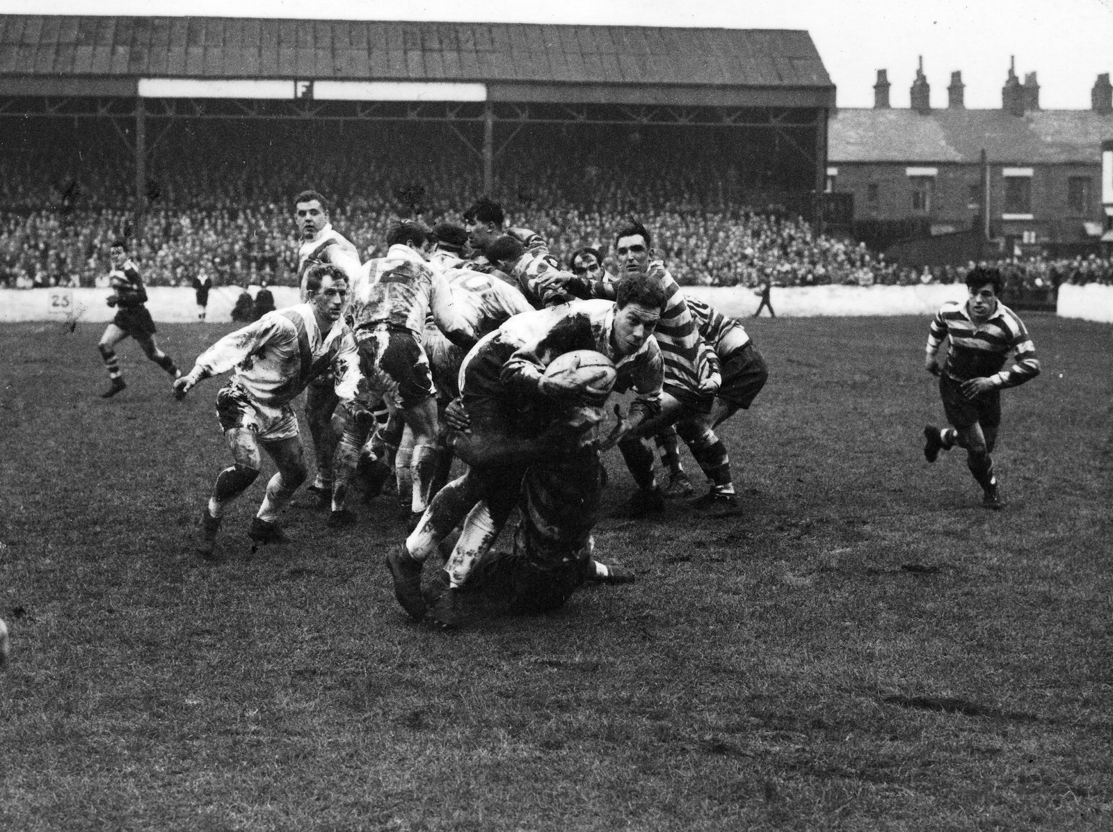 Albert Blan is tackled watched by Ken Gowers, Tom Grey and Brian Hatherell - Dec 26th 1960.
