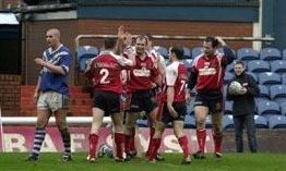 Oldham celebrate after a try v Swinton - April 4th 2004.