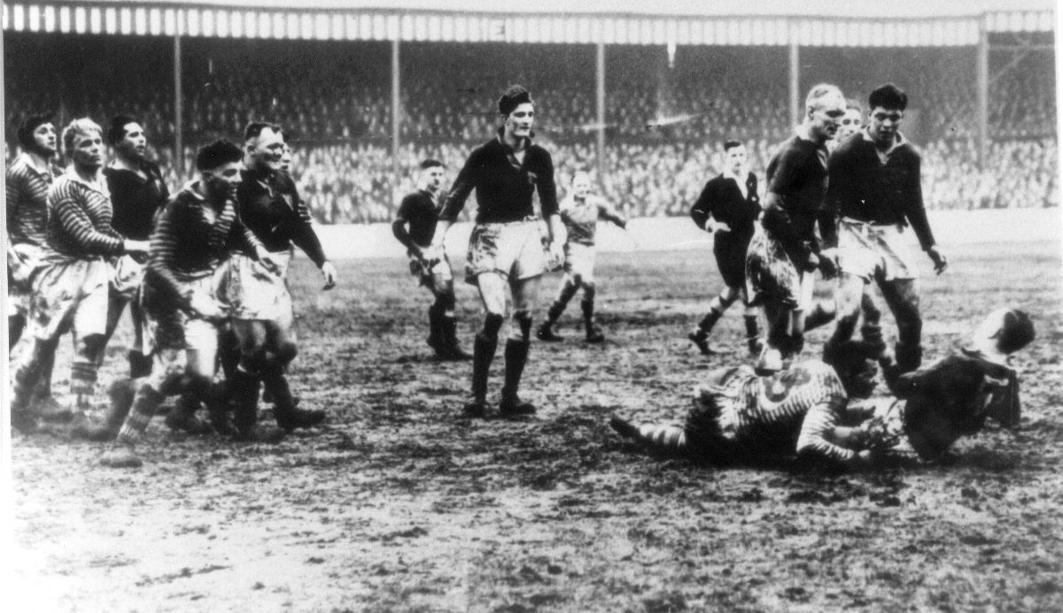 Alex Givvons brings down a Wakefield player - Jan 31st 1948.