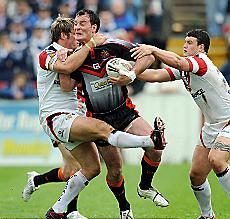 Roughyeds captain Rob Roberts is caught by Oliver Wilkes (left) and Jay Pitts - June 1st 2008.