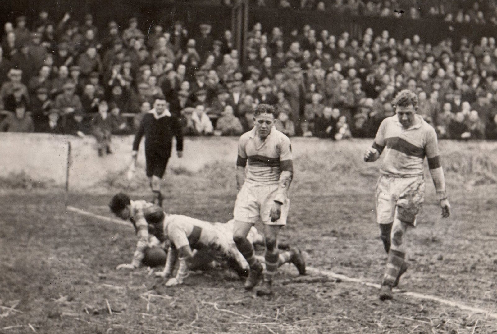 Joe Warham scores one of his three tries to the dismay of the Whitehaven defenders - Feb 18th 1950.