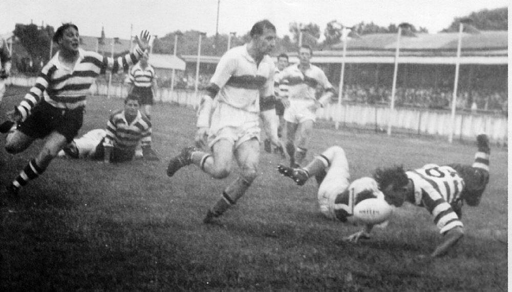 The ball goes loose as Jack Keith and Des McKeown (left) try to regather - March 15th 1958.