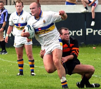 Neil Roden tackles Howard Hill. Whitehaven v Oldham - July 21st 2002.