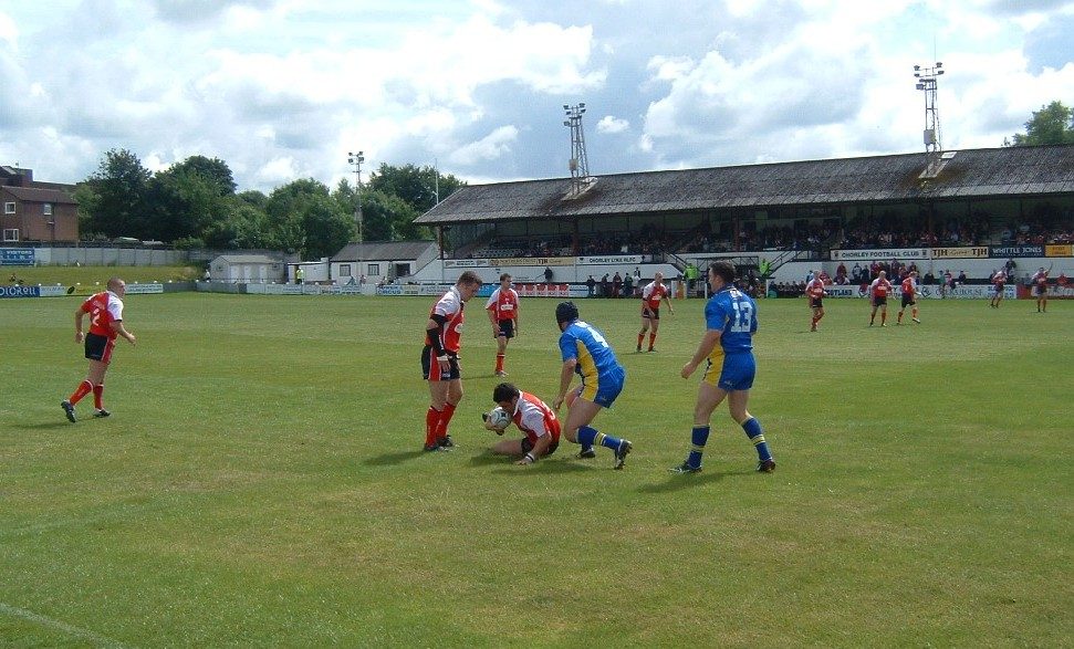 James Bunyan prepares to play the ball. Oldham v Whitehaven played at horley - June 20th 2004.