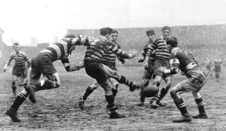 Syd Rix gets a kick away v Widnes - Feb 21st 1925.