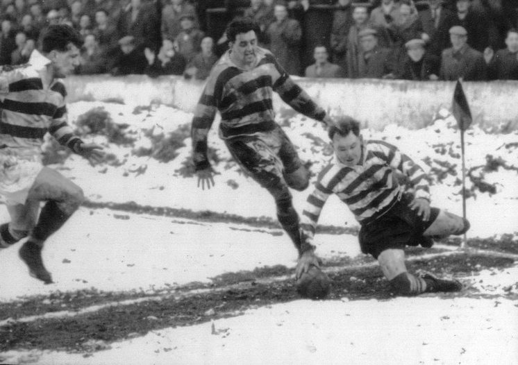 Frank Stirrup toches down at a snowy Watersheddings v Widnes - Feb 16th 1957.