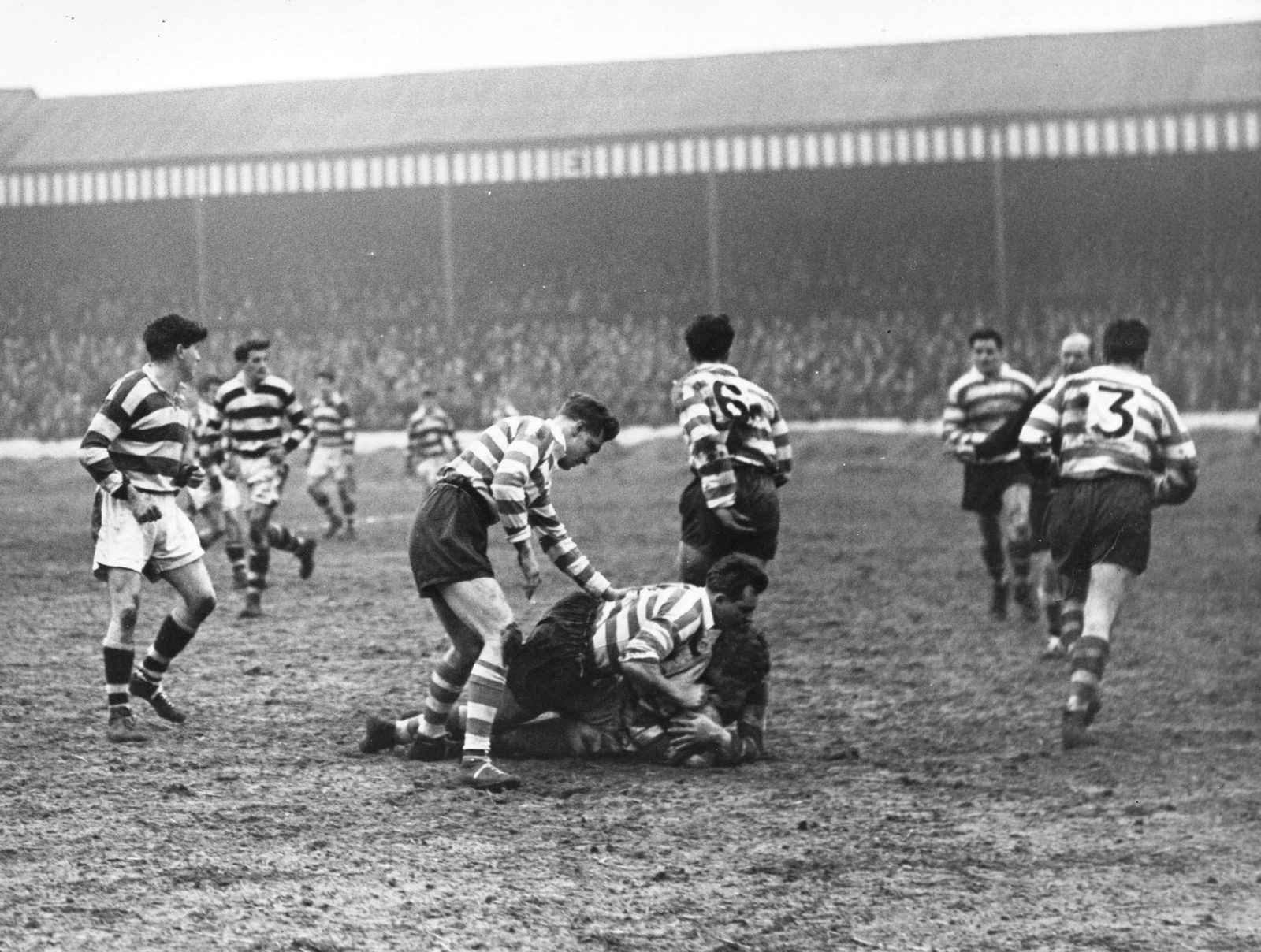 John Etty and Dennis Ayres tackle Major of Widnes - March 25th 1958.