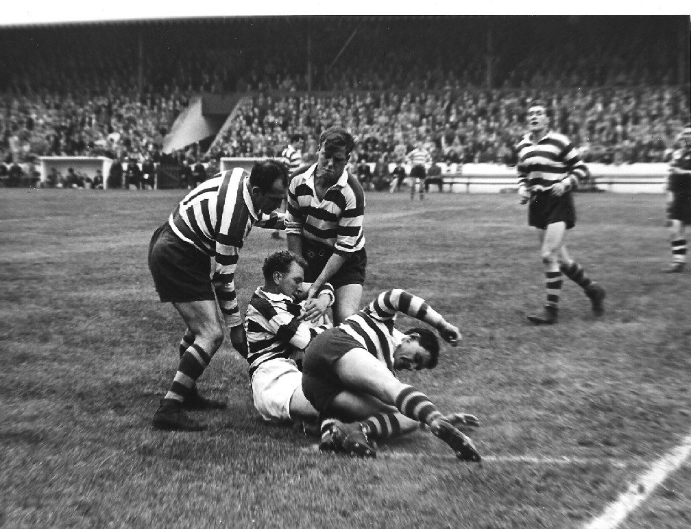 Charlie Winslade, Des McKeown and Geoff Robinson combine to bring down a Widnes player - Sep 19th 1959.