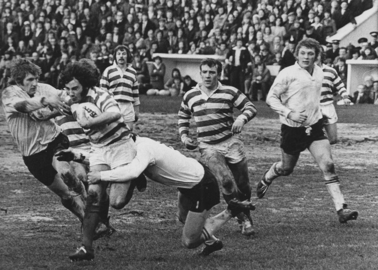 David Treasure takes on the Widnes defence watched by Dickie Brown and Mick McCone - March 9th 1975.
