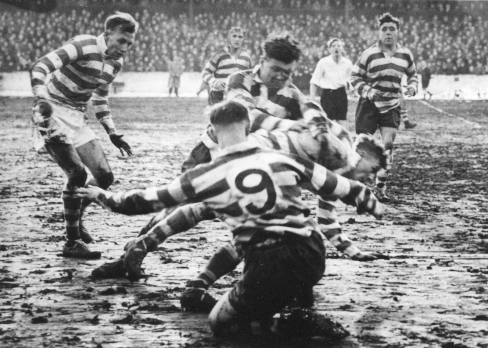 Harry Ogden and Jack Keith bring down Tommy Parr - Feb 12th 1955.