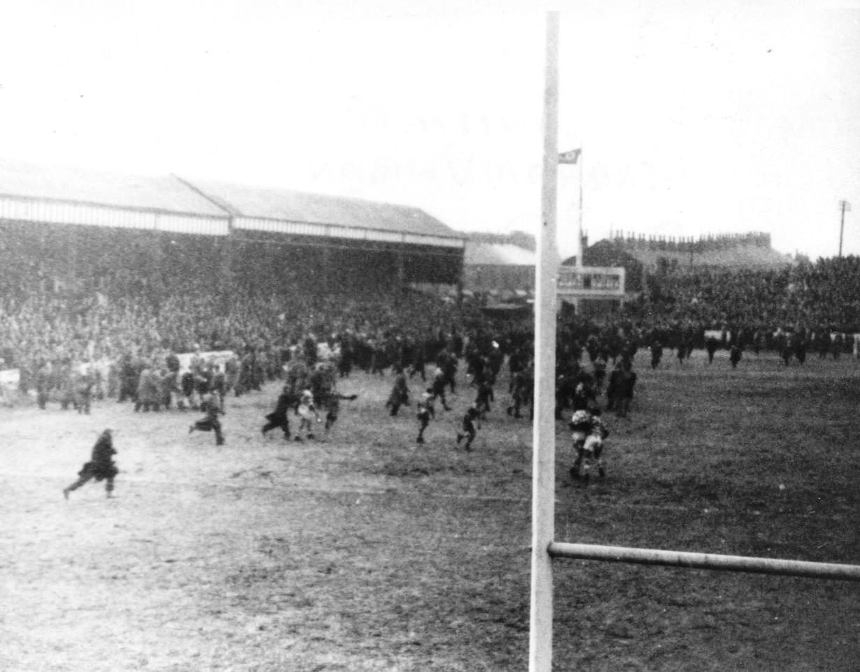Wigan fans invade the pitch at the final whistle - March 8th 1958.