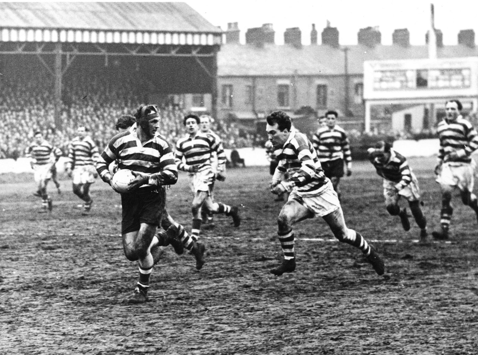 Sid Little breaks through pursued by Terry O'Grady - April 5th 1958.