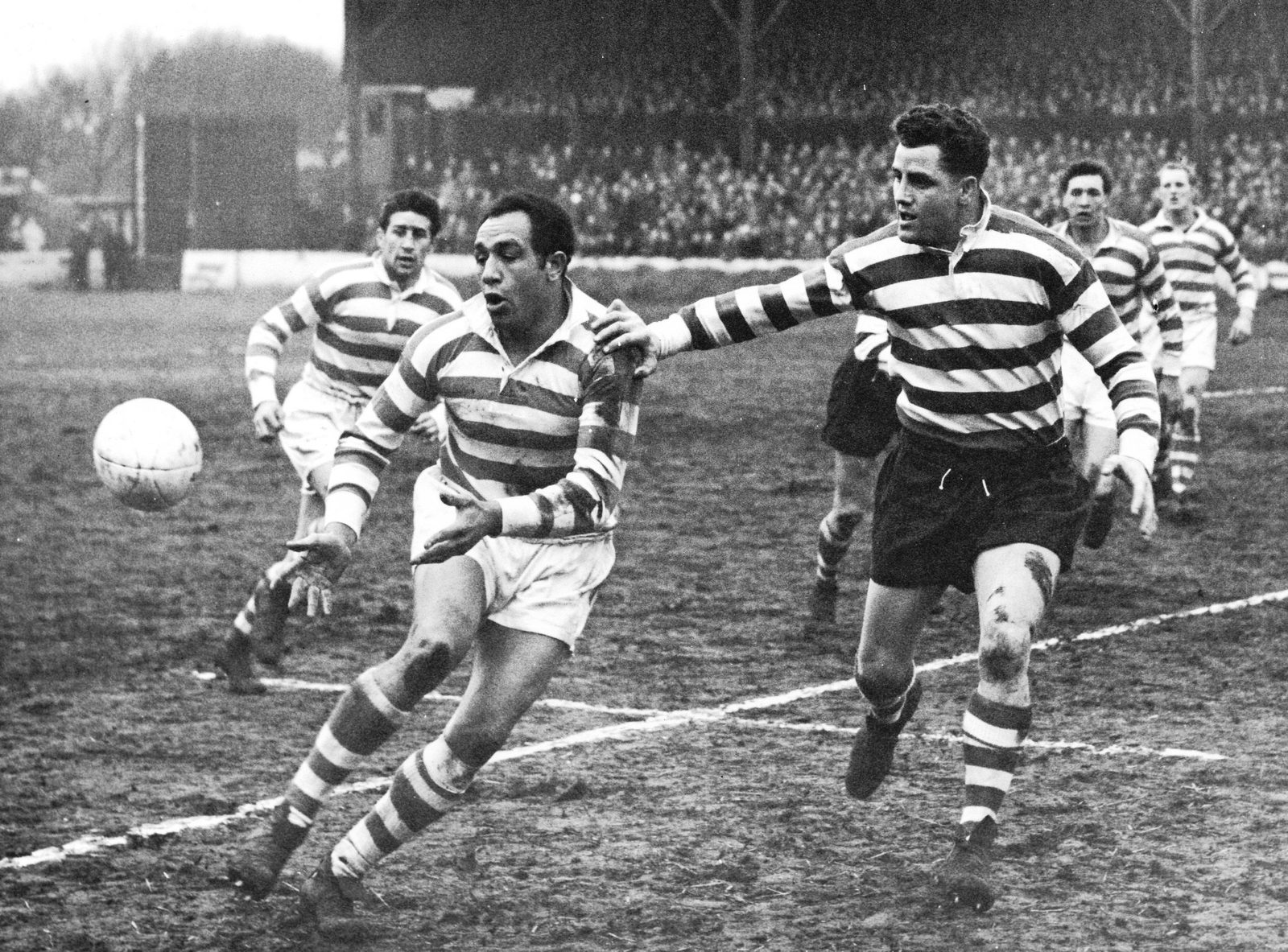 Derek Turner moves in on Billy Boston - April 5th 1958.