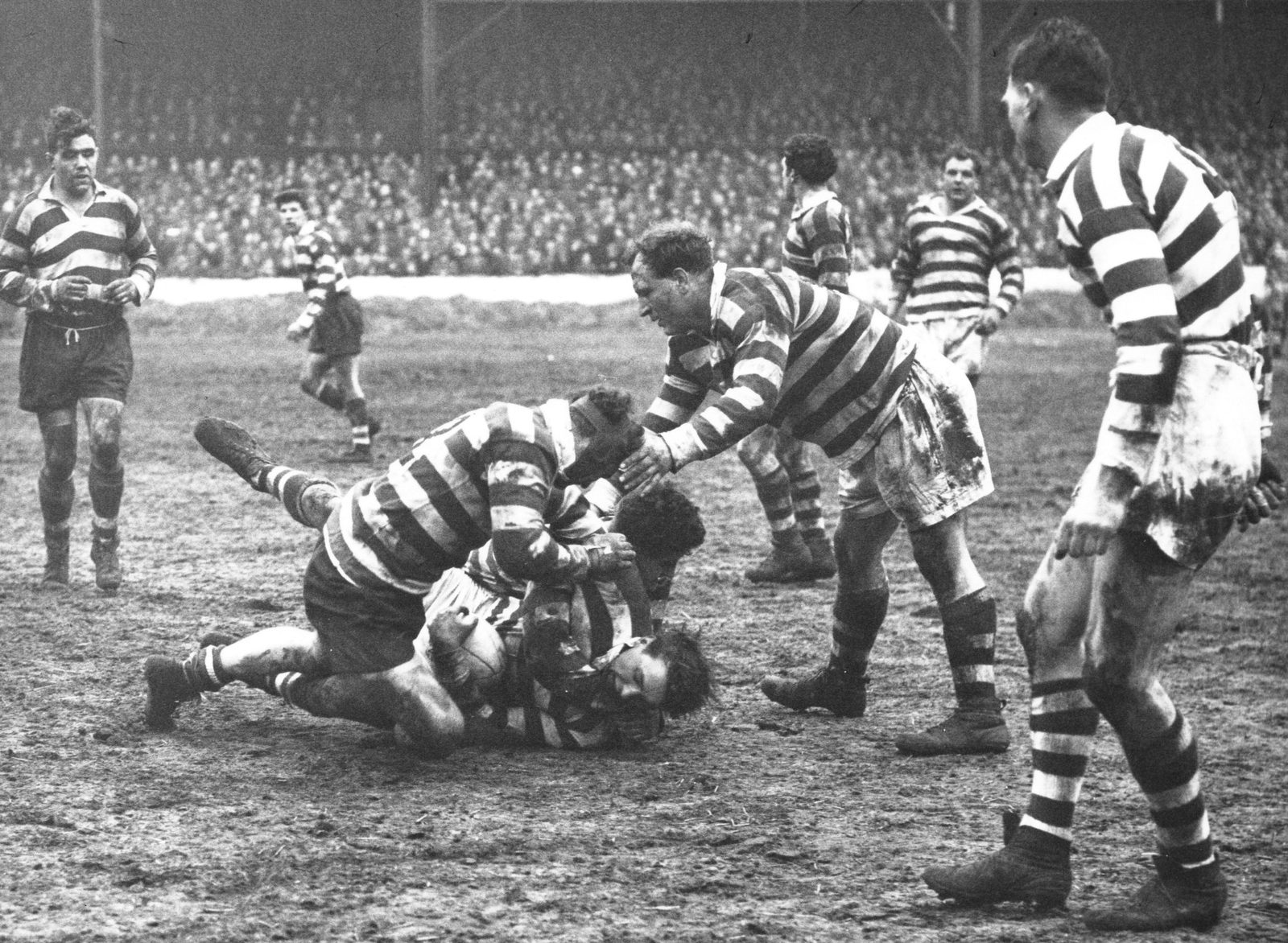 Derek Turner and Sid Little tackle Frank Griffin - April 5th 1958.