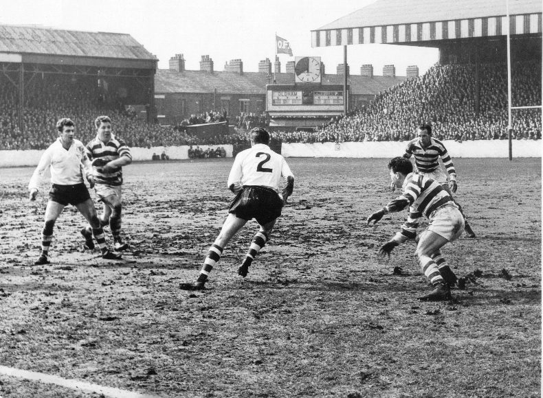 John Donovan, watched by Ray Fisher, takes on the Wigan defence of Frank Collier, Frank Pitchford and Stan McLeod - April 6th 1963.