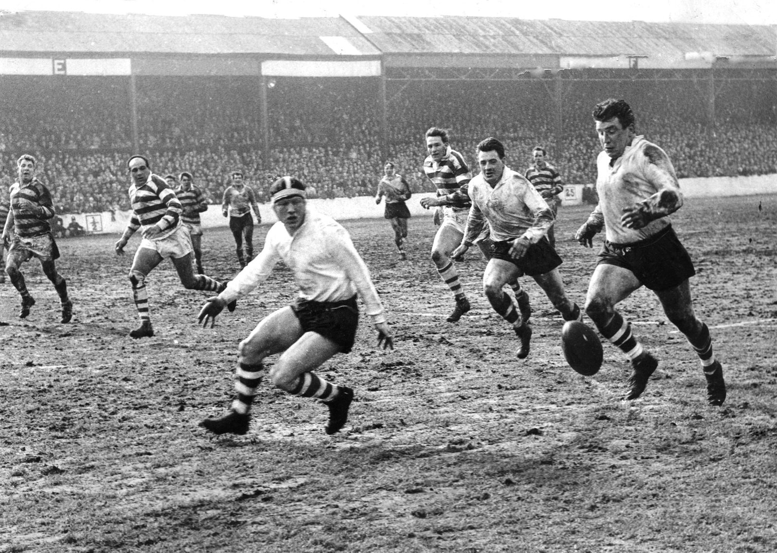 Trevor Simms, John Noon and Peter Smethurst chase a loose ball - April 6th 1963.