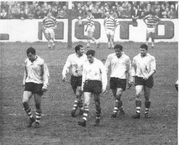 The Oldham players walk back after John Donovan's try - Nov 21st 1964.
