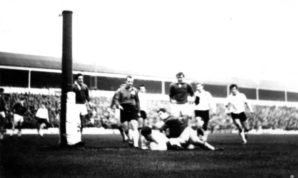 Bob Irving is hauled down just short of the Wigan line in the 1966 Lancs Cup Final - Oct 29th 1966.