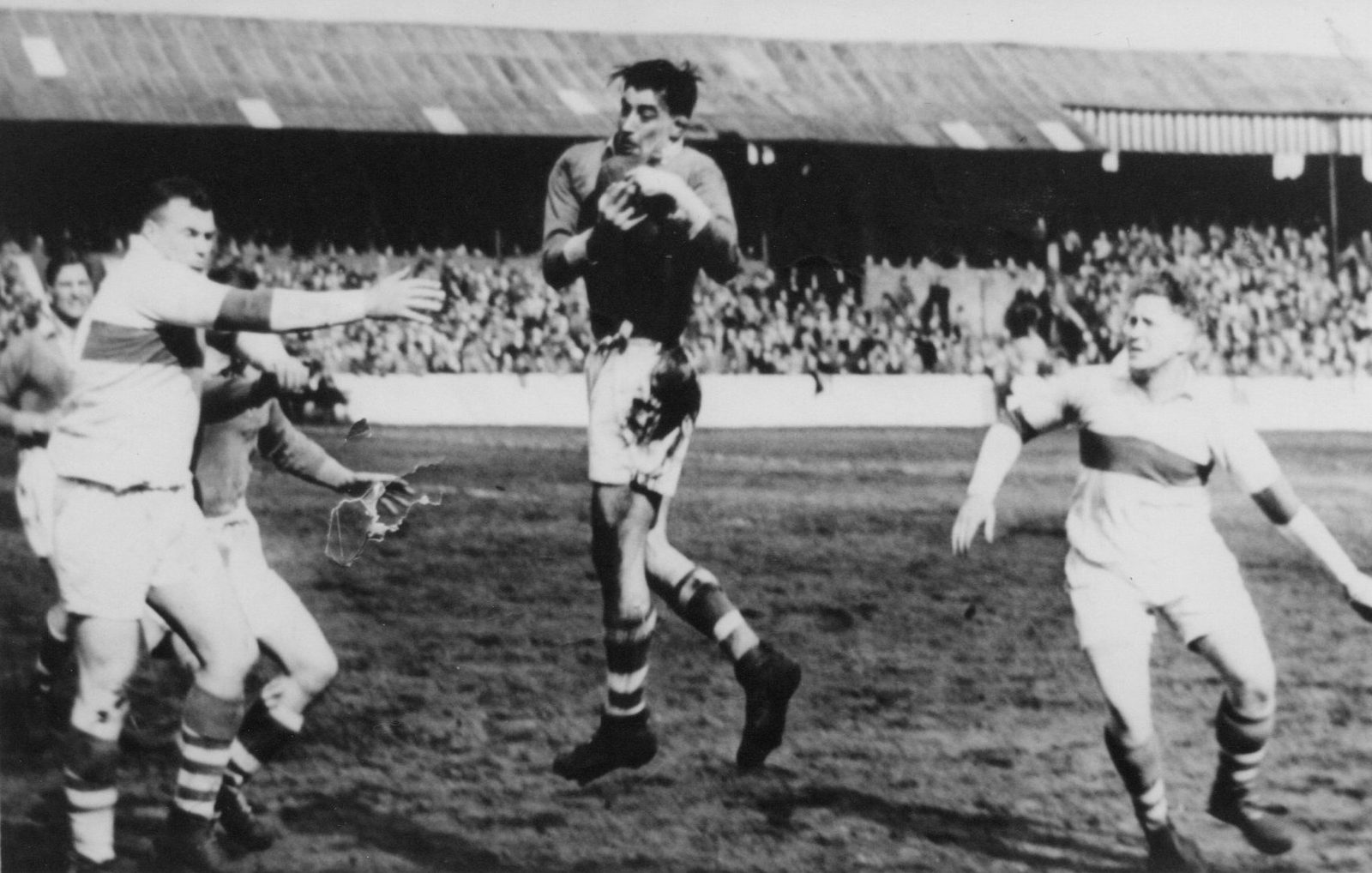 Bryn Goldswain leaps to catch the ball - April 15th 1950.