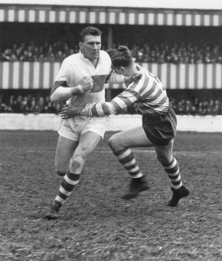 Ike Southward attempts to escape the clutches of John Etty - April 26th 1958.