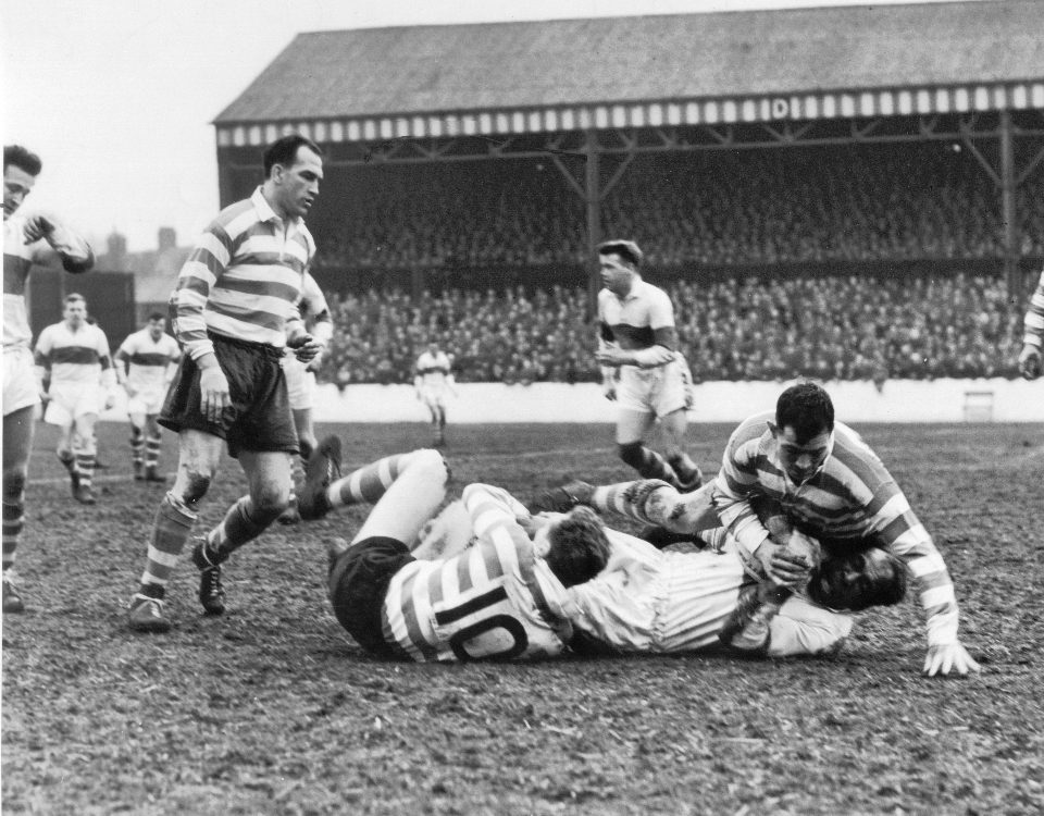Alan Davies and Roger Dufty bring down Cec Thompson as Charlie Winslade looks on - April 26th 1958.