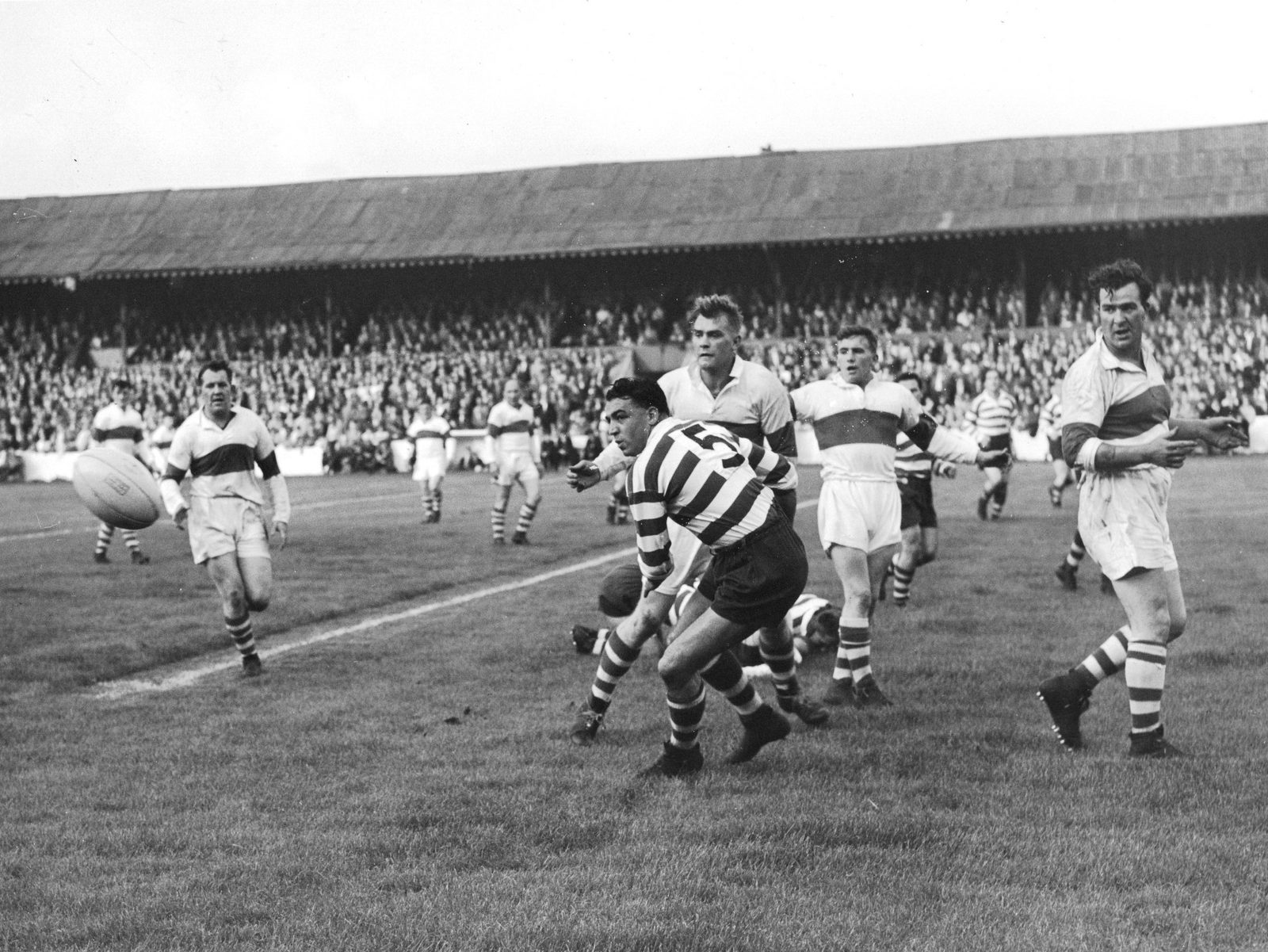 Dick Cracknell moves in too late to stop a Workington pass - Sep 2nd 1958.