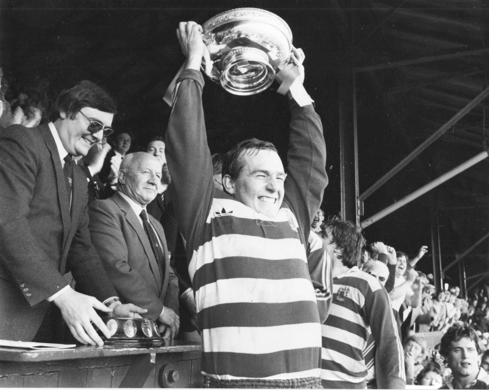 Terry Flanagan hoists the 2nd division Championship trophy aloft after victory over Workington - May 9th 1982.
