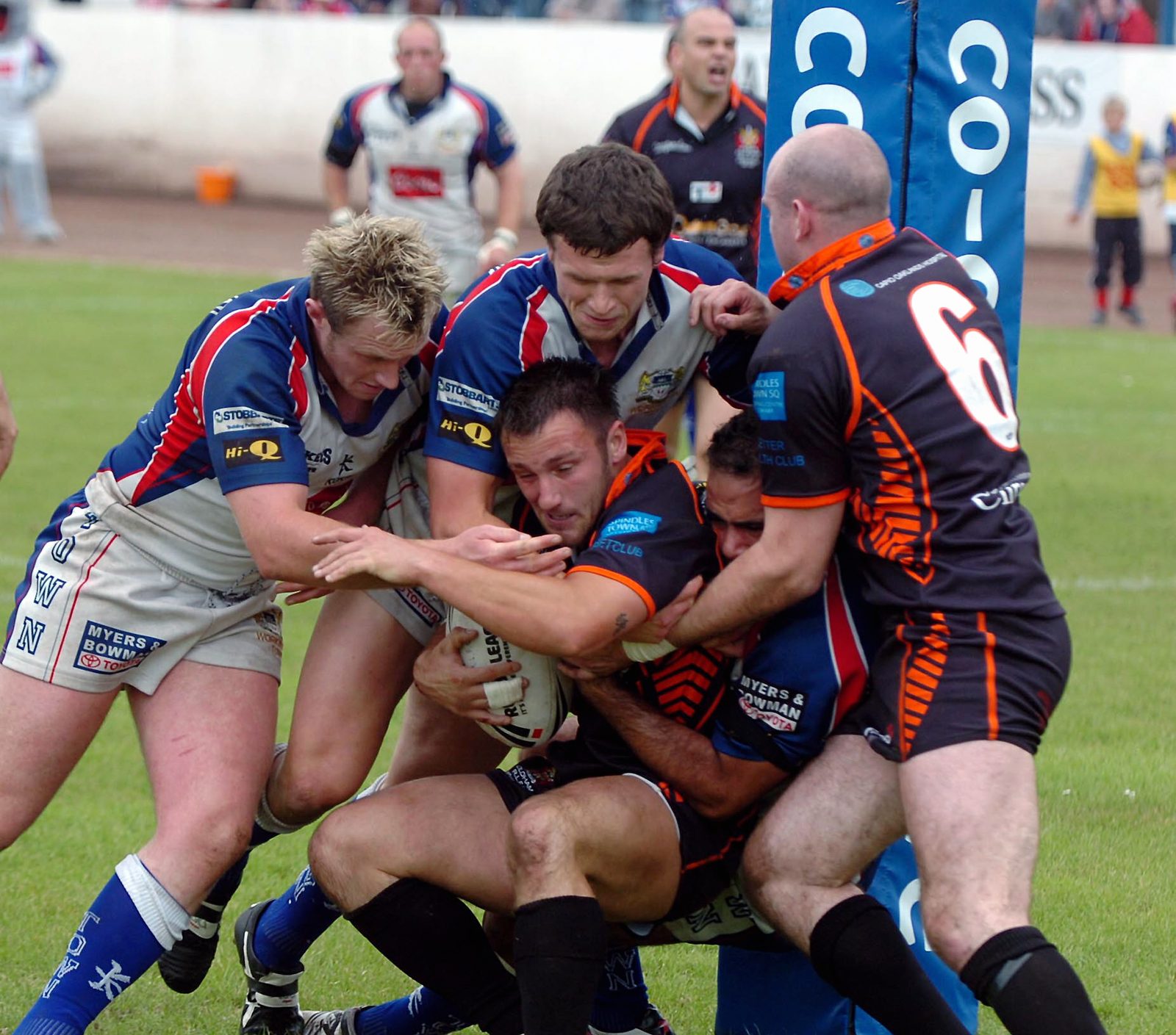 Three Workington players force Gareth Langley back over the try-line as Neil Roden lends a hand June 3rd 2007.