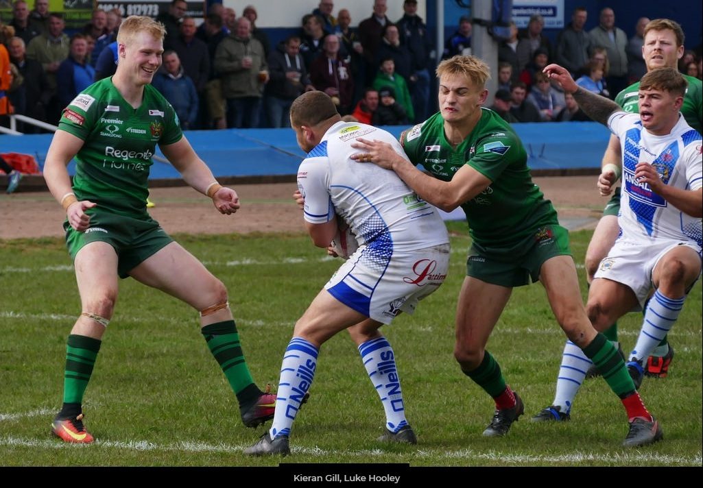 Luke Hooley tackles a Workington player watched by Keiran Gill and Paul Crook - April 29th 2018.