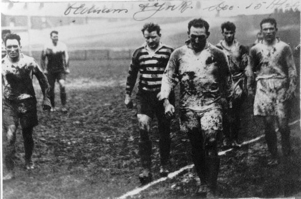 The Oldham and York players leave the pitch at a muddy Watersheddings - Dec 15h 1924.