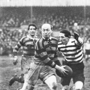 Evan Davies goes to tackle George Prudence at Watersheddings - possibly 1919.