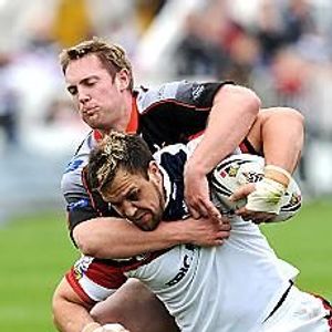 Oldham's Jason Boults gets to grips with Danny Sculthorpe, of Wakefield - June 1st 2008.