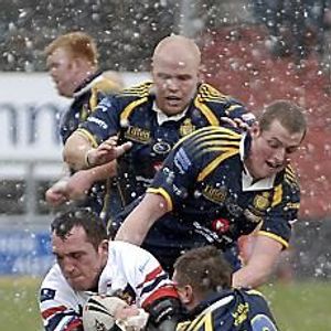Tommy Goulden drives the ball in, on a snowy Boundary Park - April 6th 2008.
