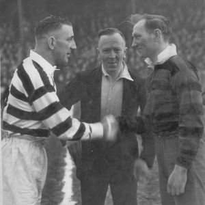Edgar Brooks shakes hands with the Broughton Moor captain - Feb 12th 1949.